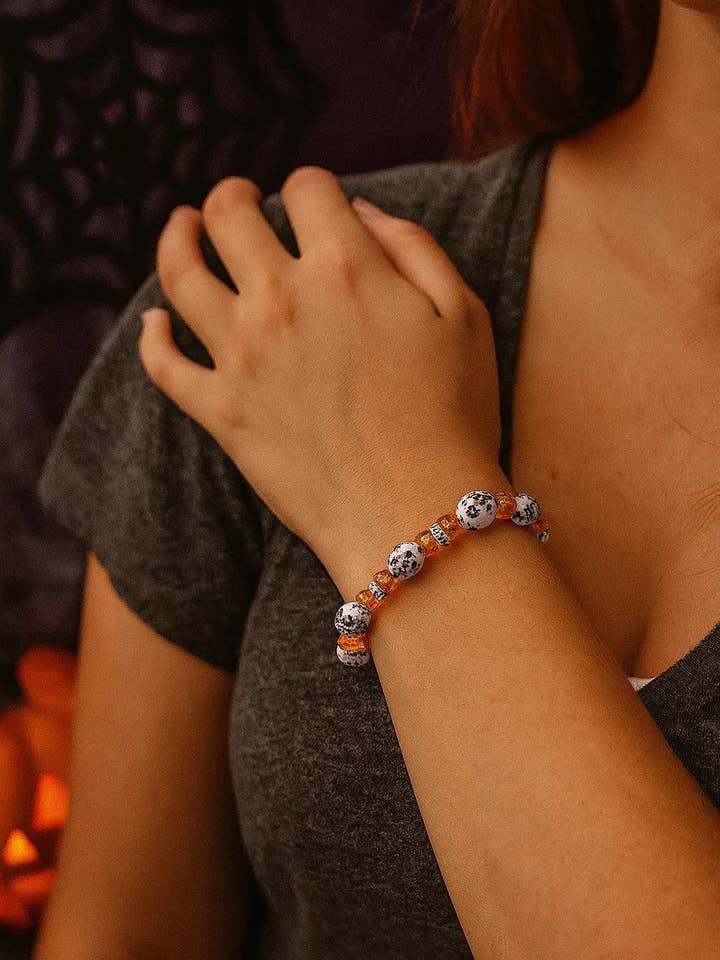 Spooky Halloween Bracelet: Orange Crystal & Black Floral Got for wholesale by Bad Apple Designs