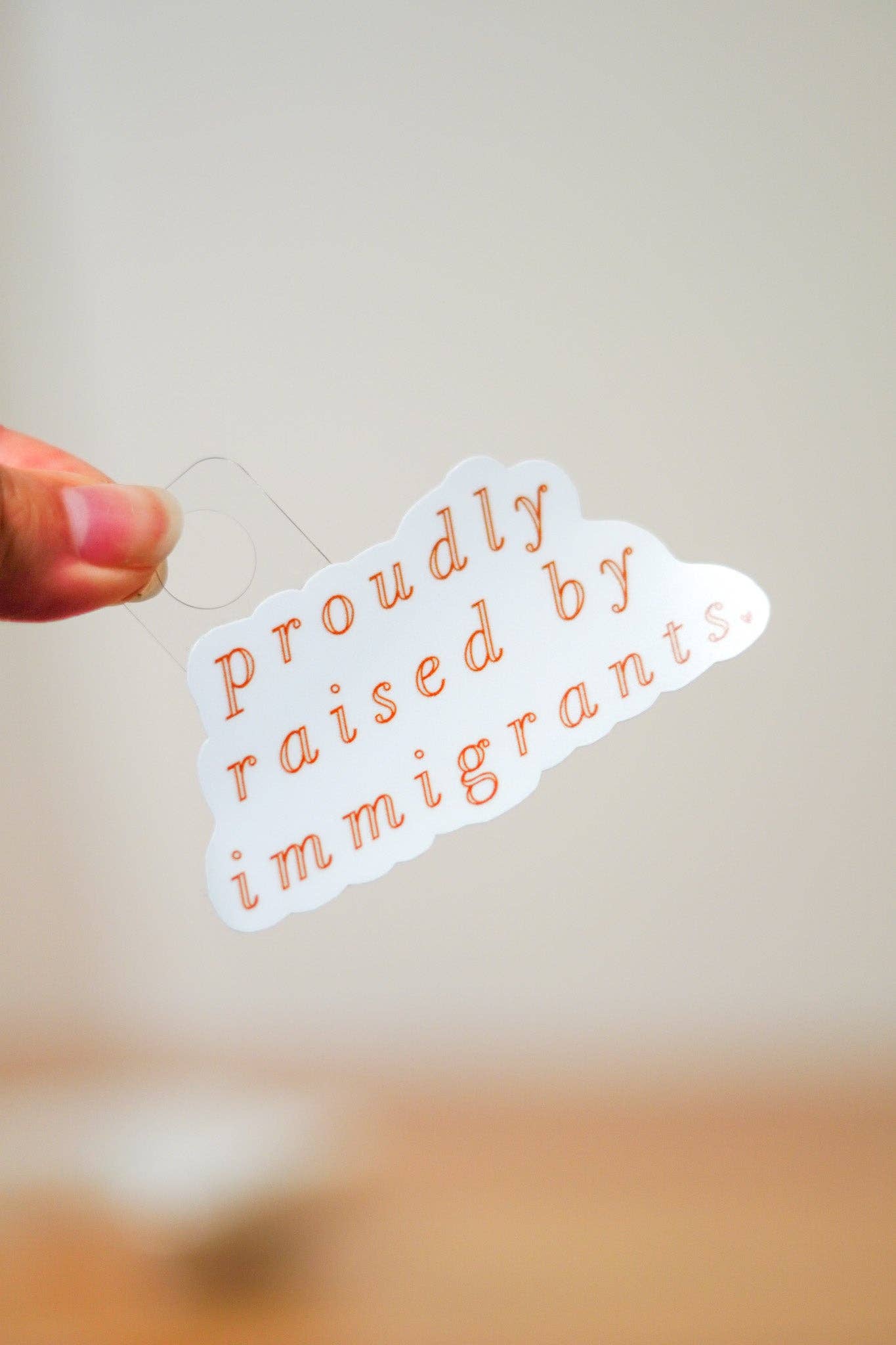 Latina Dreamer Designs - Wholesale Sticker - 'Proudly Raised By Immigrants' Sticker0