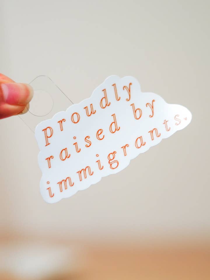 'Proudly Raised By Immigrants' Sticker for wholesale by Latina Dreamer Designs