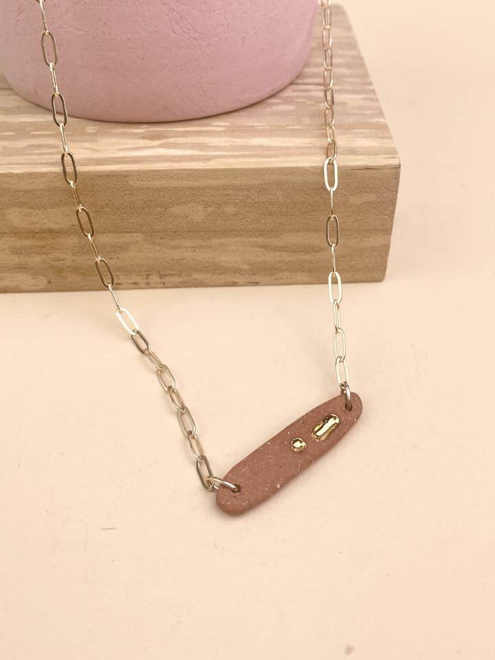 Lascaux Necklace - Ceramic Abstract Necklace, Goldfill Chain for wholesale by Barrow PDX