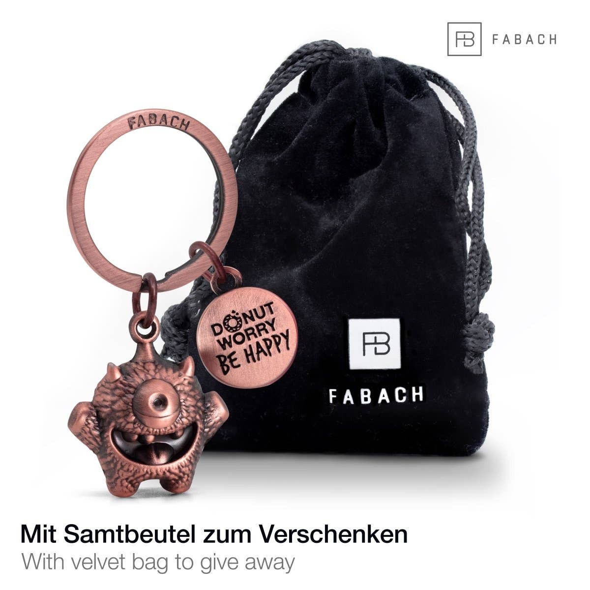 FABACH – Die Schlüsselanhänger-Schmiede – Porta-chaves - Unissexo por atacado – Chaveiro 'Cyklops' de incentivo – monstrinho sorteado com gravação 'Donut worry, be happy!' – amuleto da sorte Kummermampfer4