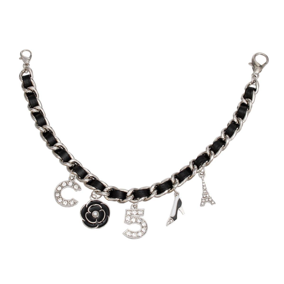 Mini Bucket Black Quilted Silver Camellia Luxe Bag for wholesale on Faire3