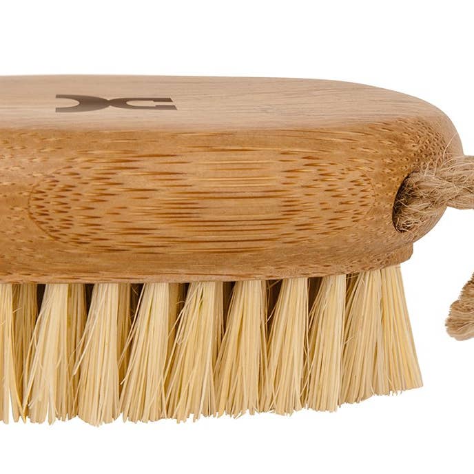 Croll & Denecke Nail brush with coconut bristles on a string for wholesale by A Fine Choice