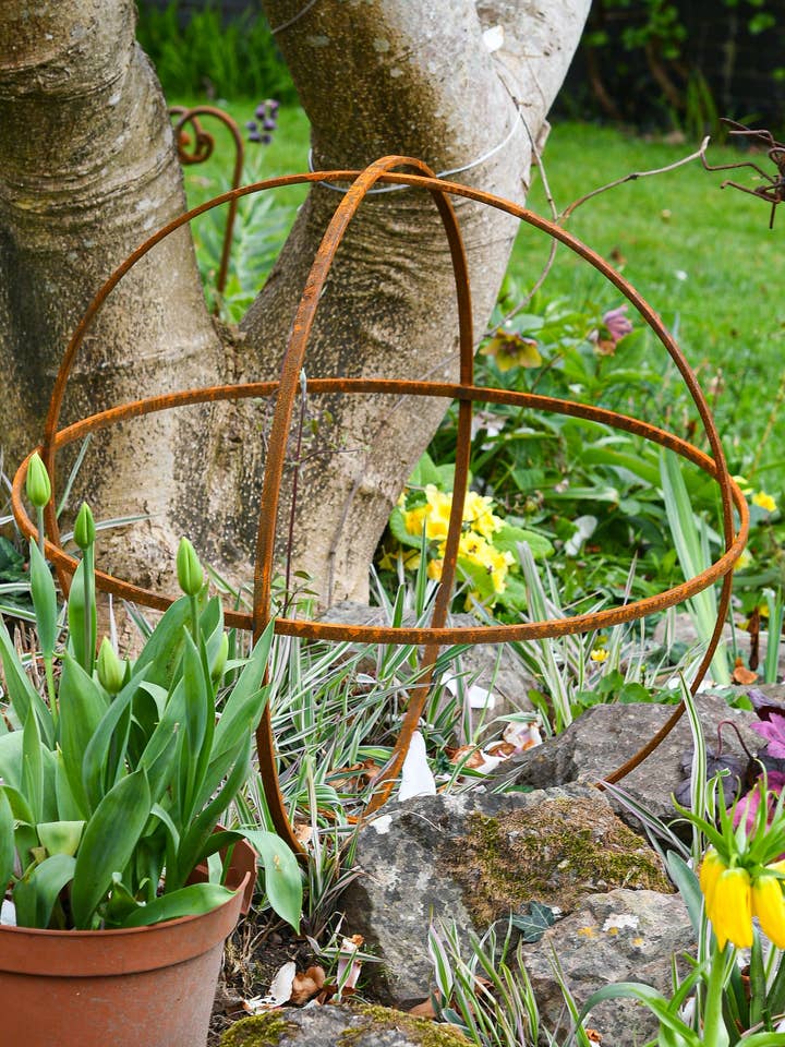 Rusty Metal Garden Sphere Sculpture for wholesale by Savage Works