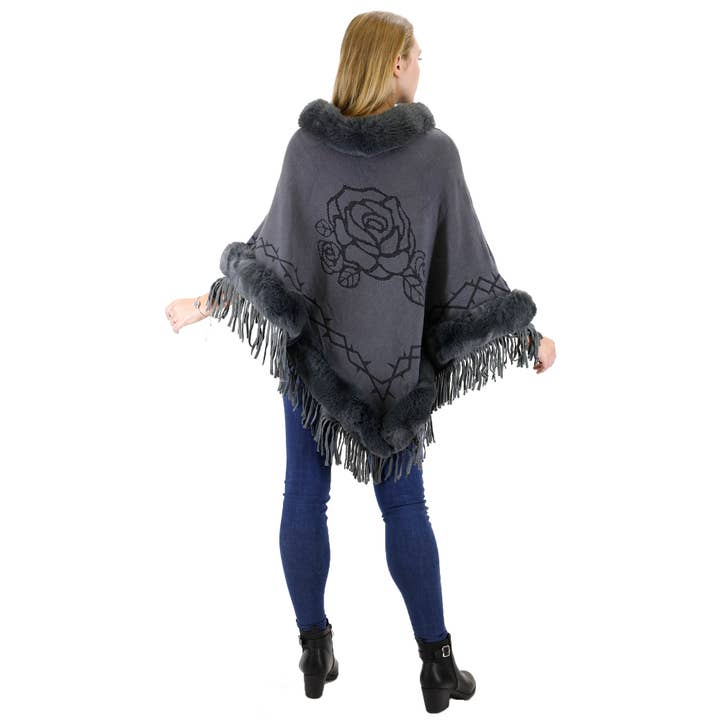 SURTIDO PONCHO DE PIEL CON FLECOS Y ESTAMPADO DE ROSAS 196 de venta al por mayor en Faire
