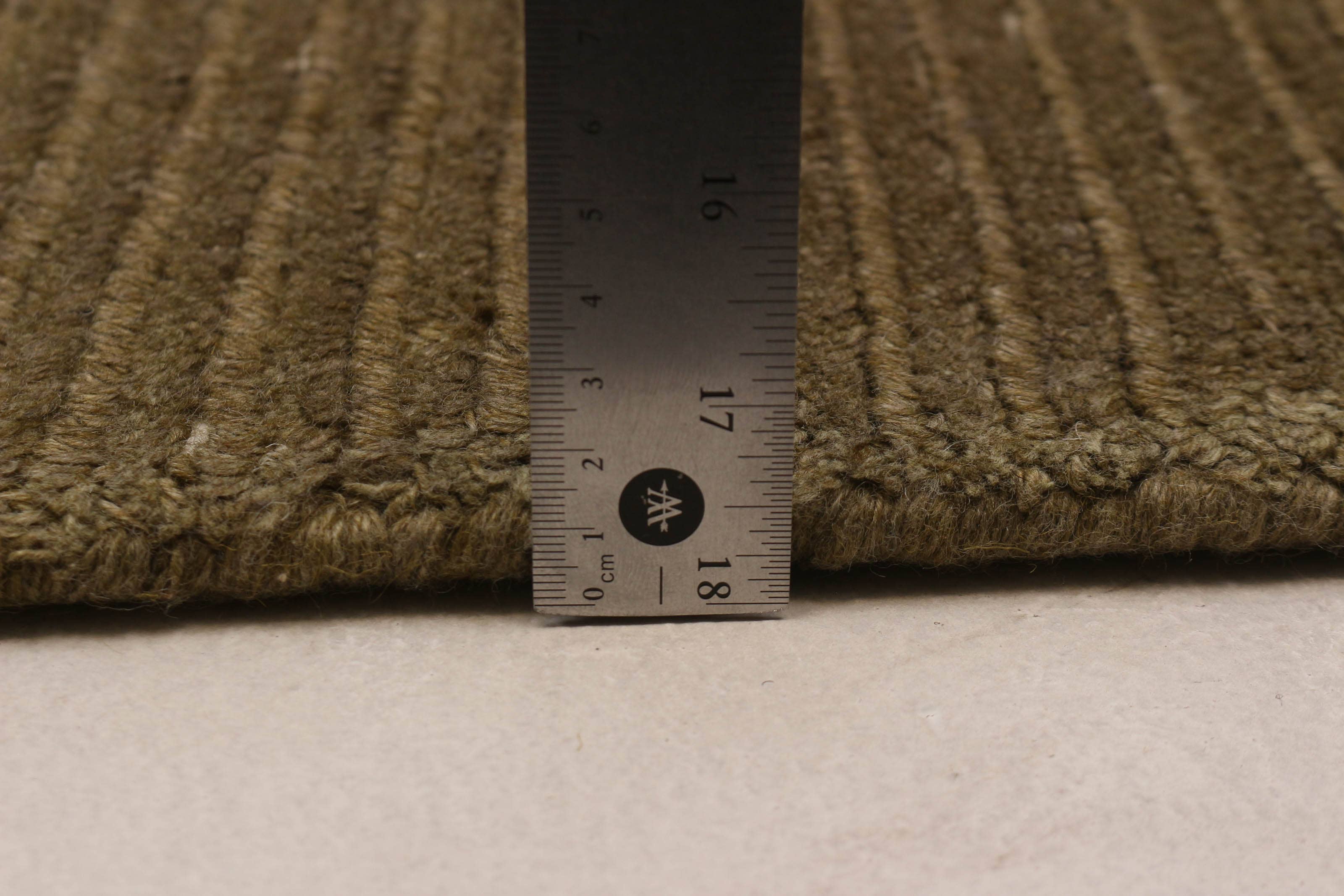 Rio Olive Area Rug for wholesale on Faire14