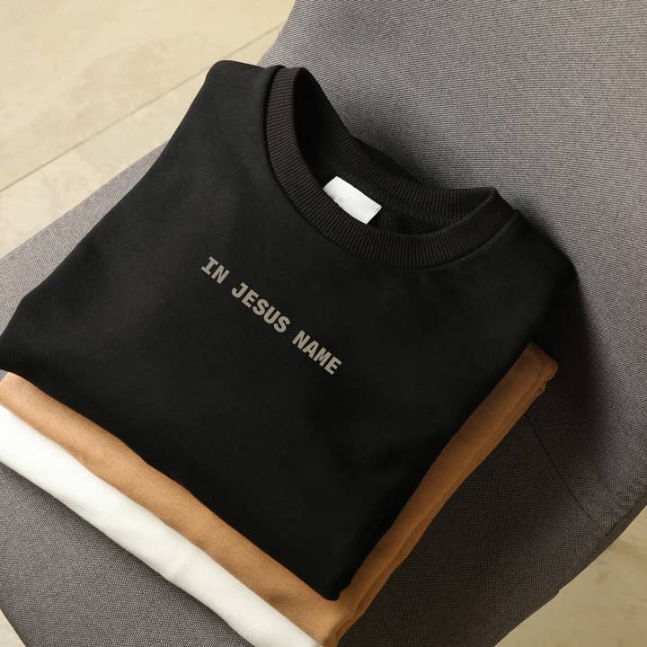 In Jesus name embroidered Sweatshirt for wholesale by Precious Sewing and Embroidery