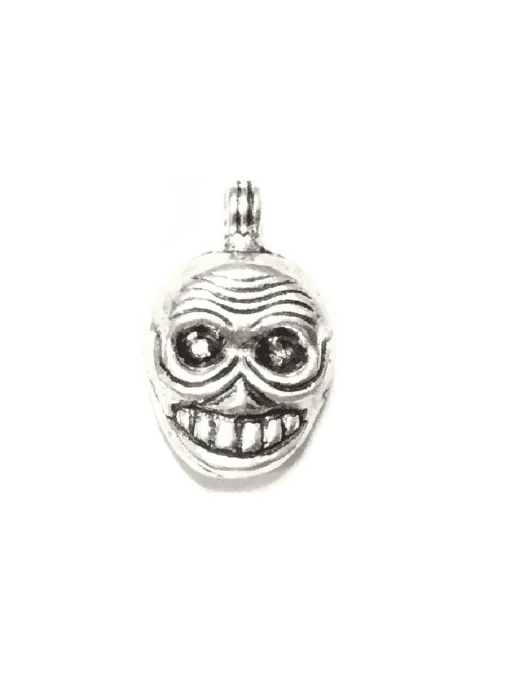 Smiling Skull Pendant for wholesale by Urbiana