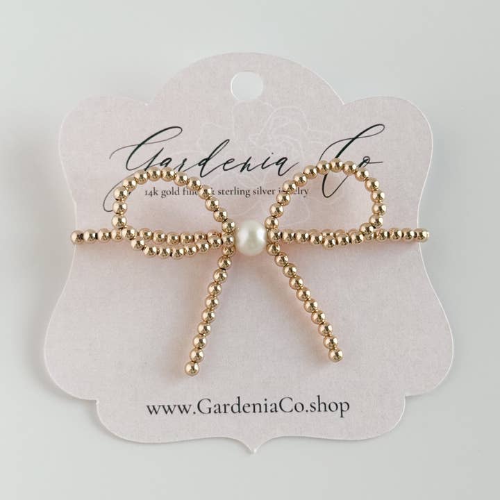 Bow Gold & Pearl Bracelet for wholesale by Gardenia Co