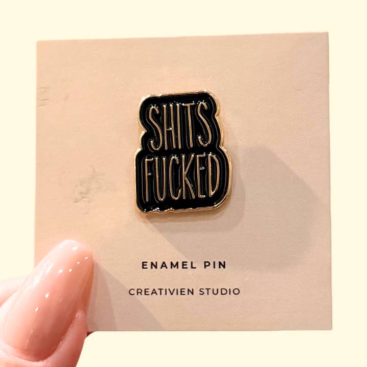 Shits Fucked Enamel Pin for wholesale by Creativien Studio