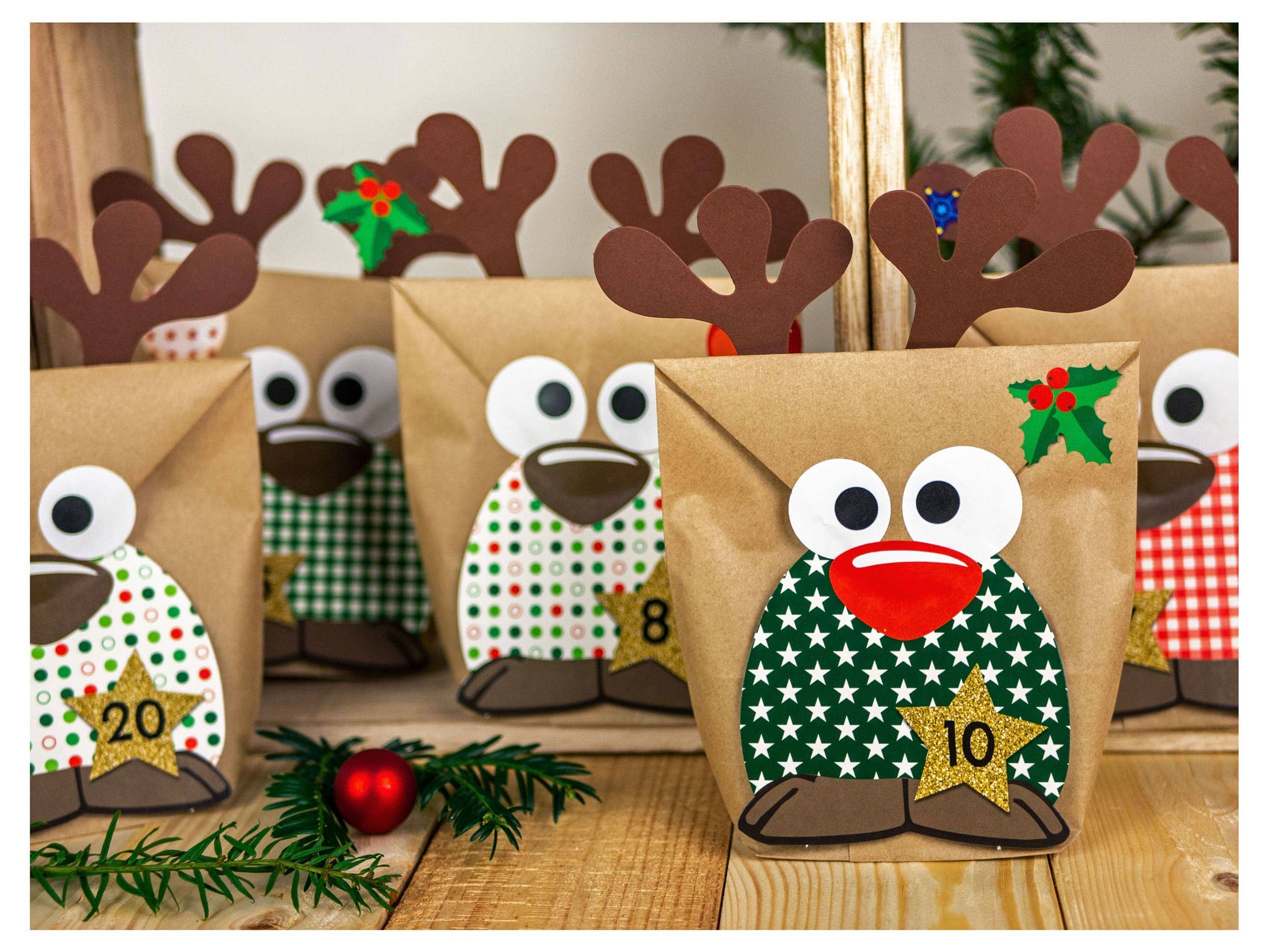 Papierdrachen – Großhandel Adventskalender – Adv Rentiere - mit roten Bäuchen2
