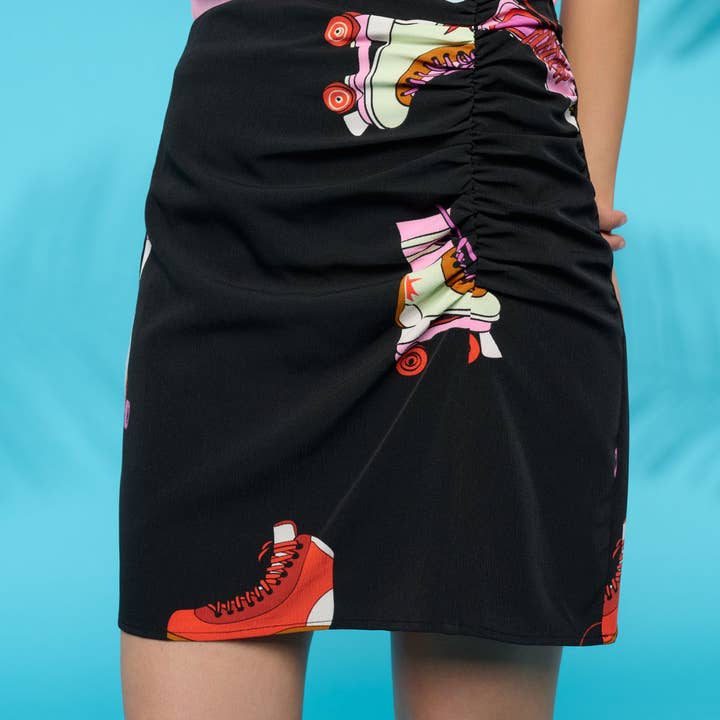 Midirock mit seitlicher Raffung und Rollschuh-Print für den Großhandel von Minueto