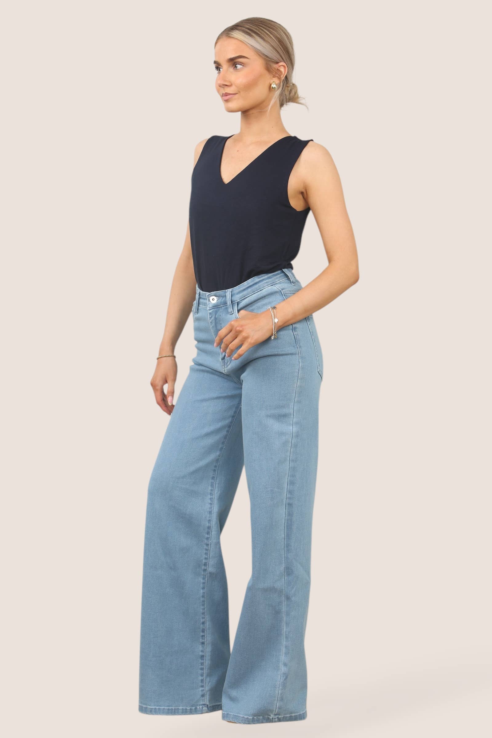 J5FASHION - Vendita all'ingrosso Jeans - Donna - JEANS A GAMBA LARGA A VITA ALTA IN DENIM10