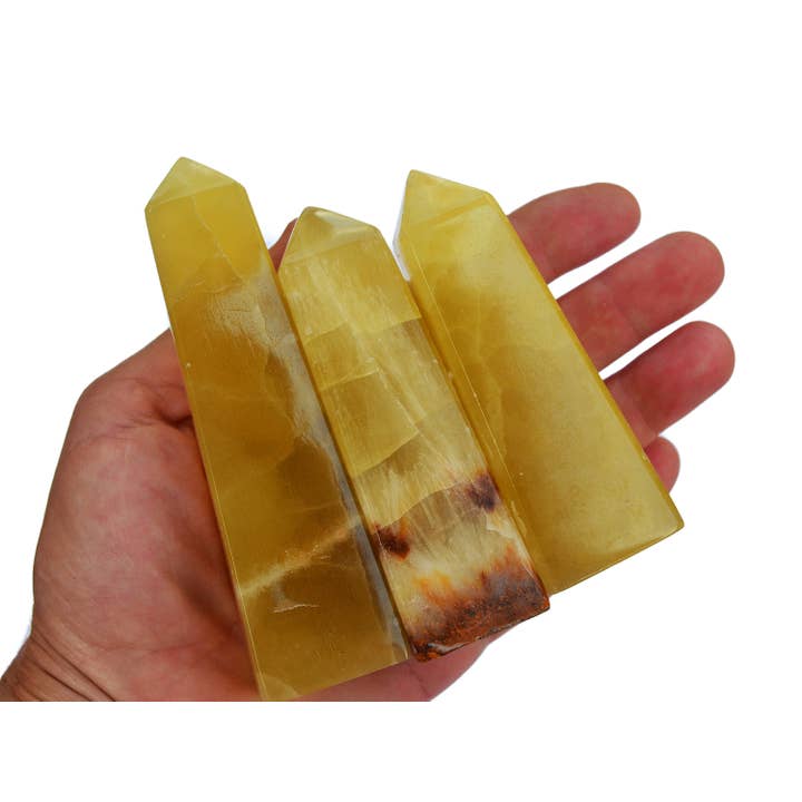 Lemon Calcite Obelisk Crystal (70g - 140g) for wholesale by Kaia & Crystals