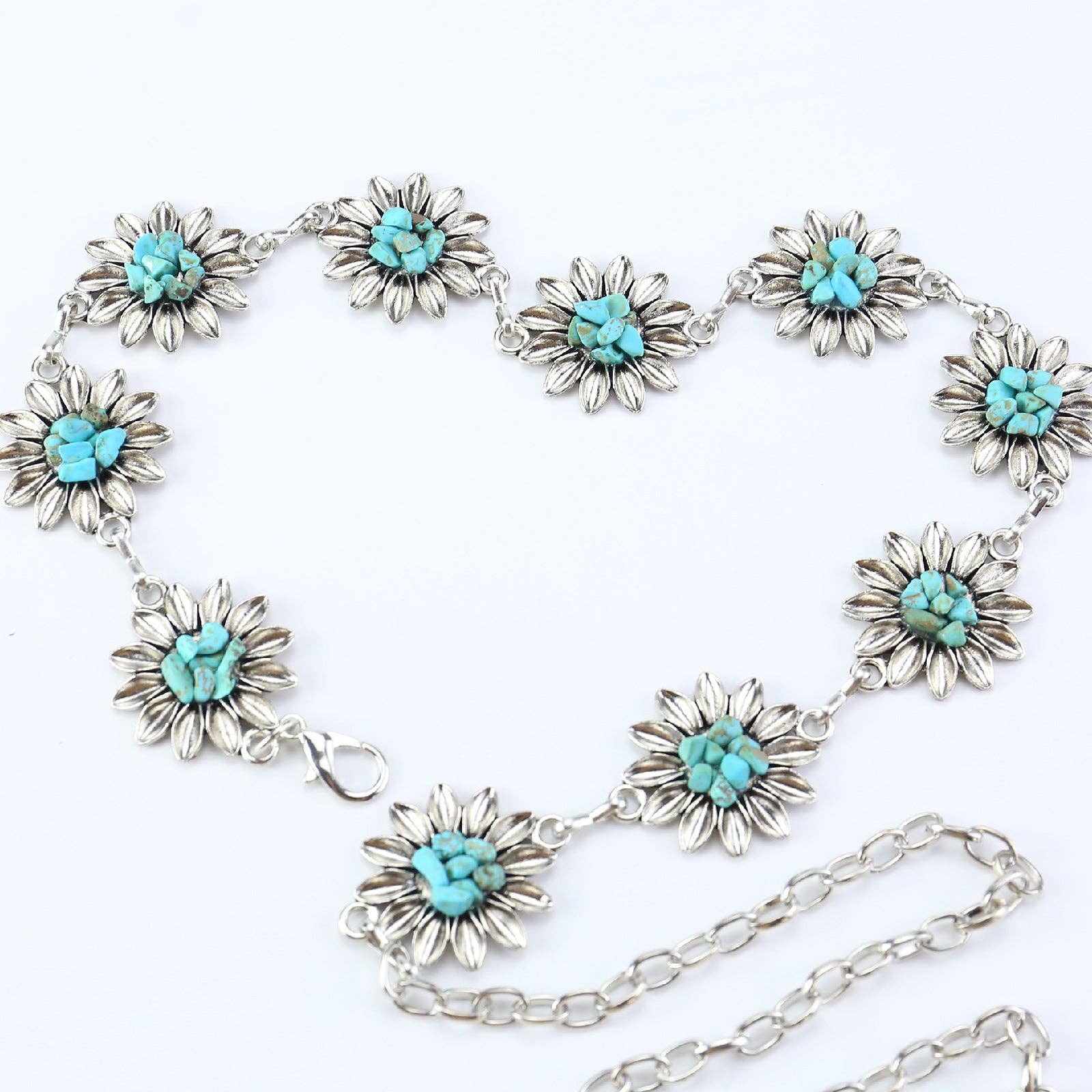 SALINA TRADING INC – Großhandel Gürtel – Damen – Metallkettengürtel mit Schmetterlings- und Herzdesign50