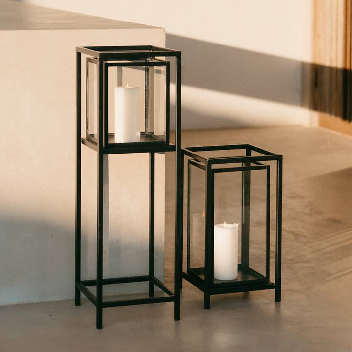 Black industrial decorative metal and glass candle holder for wholesale by Andrea House