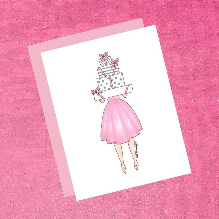 Girl Holding präsentiert pinke Mode-Illustrationskarten auf der Messe für den Großhandel von Tiffany Ascensio Designs | Watercolor Greeting Cards