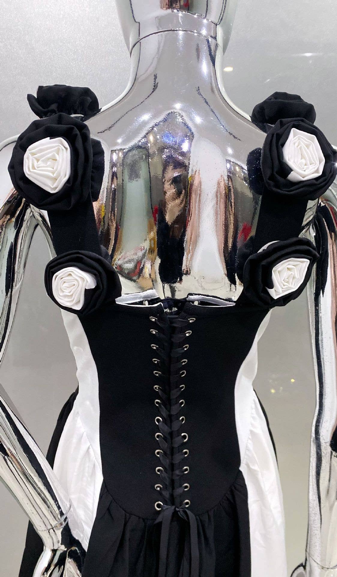 DR411 Deep V Black & White Striped Dress with Floral Accents for wholesale on Faire7