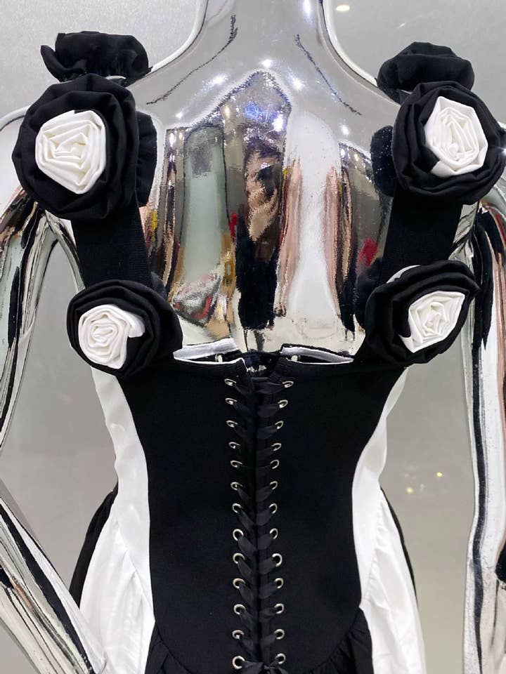 DR411 Deep V Black & White Striped Dress with Floral Accents for wholesale on Faire7