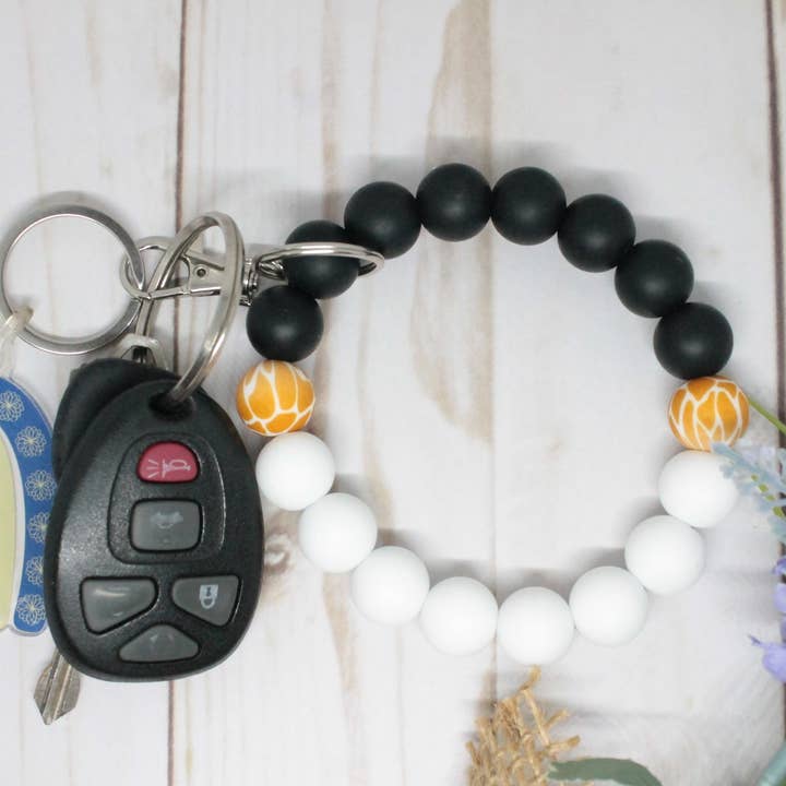 White & Black Giraffe Silicone Beaded Wristlet for wholesale by Kaysticks.co