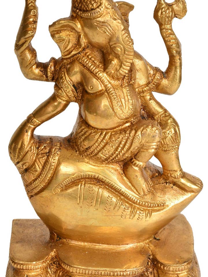 Lord Ganesha Seated on Conch In Brass Statue |Ganesha Statue for wholesale by Exotic India Art