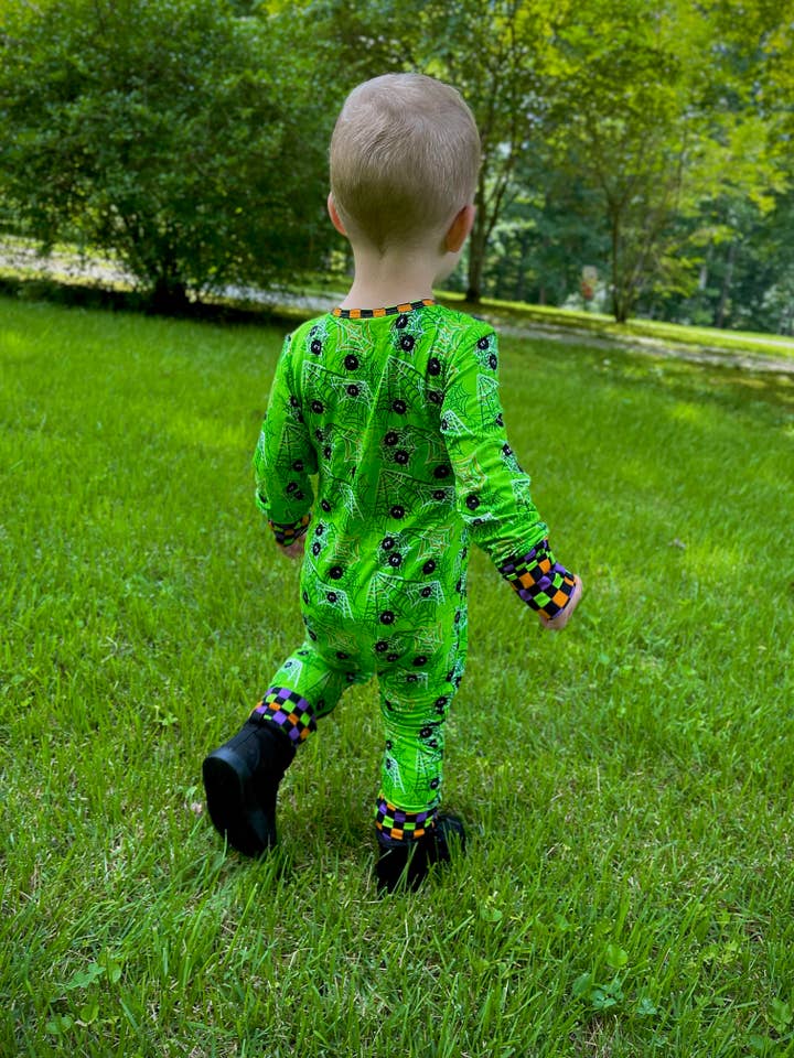 Spinnin' Webs & Turnin' Heads Crescent Zip for wholesale by Little Lights