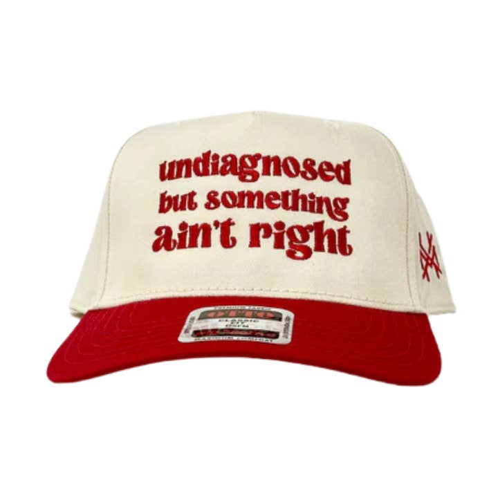Undiagnosed But Something Ain't Right Trucker Hat for wholesale by The Mad Hatter Co