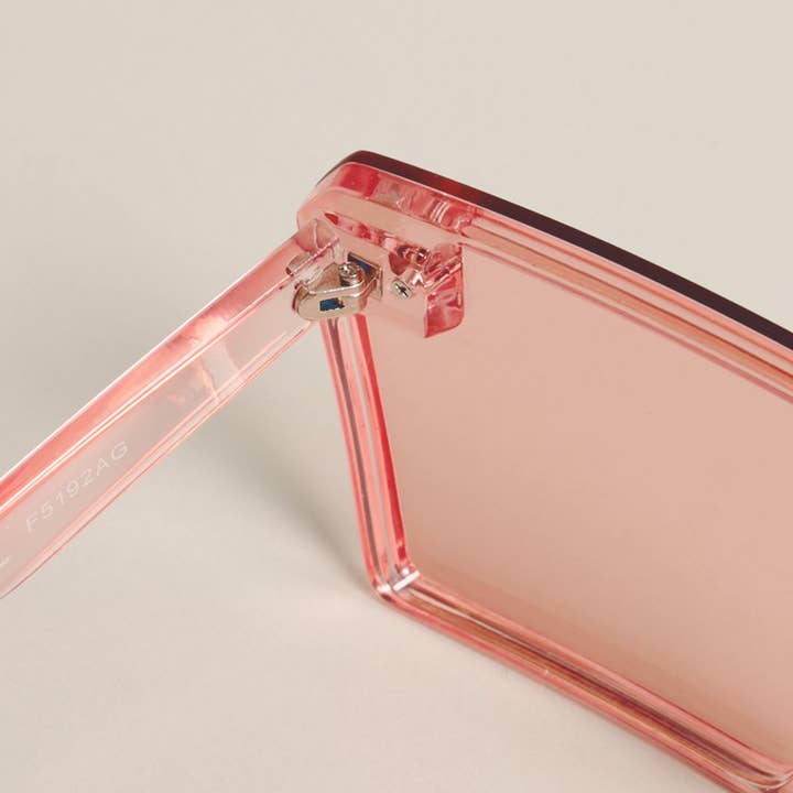 12 VERSCHILLENDE KLEUREN Uniseks transparante zonnebril met platte bovenkant voor groothandel op Faire14