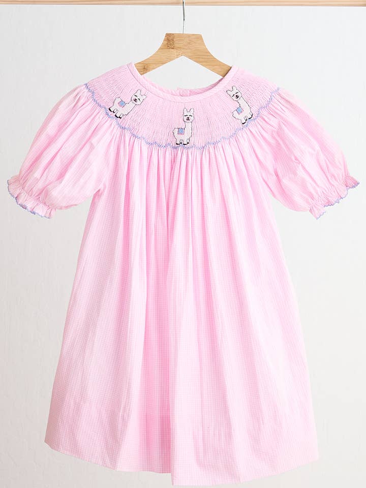 Lyserød alpaka håndrøget gingham kjole for engroshandel hos Mom & Co.
