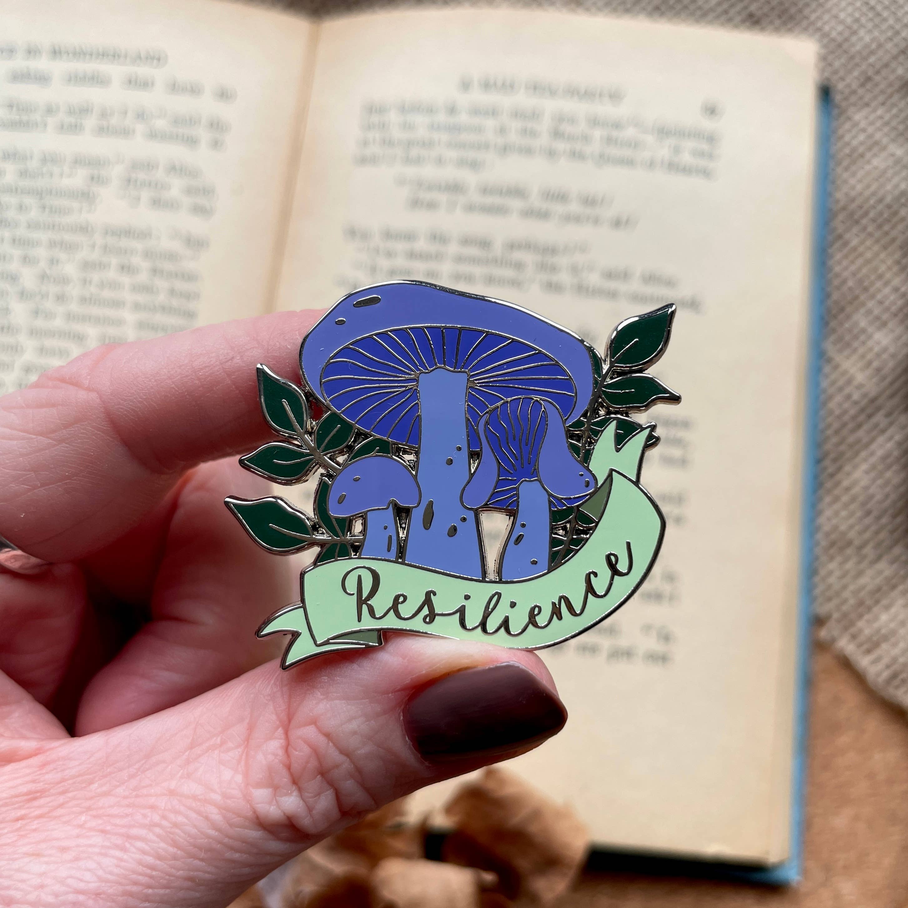 Ellis Woolley Illustration – wholesale Lapel pin/button – Amethyst Deceiver 'Resilience' Enamel Pin1