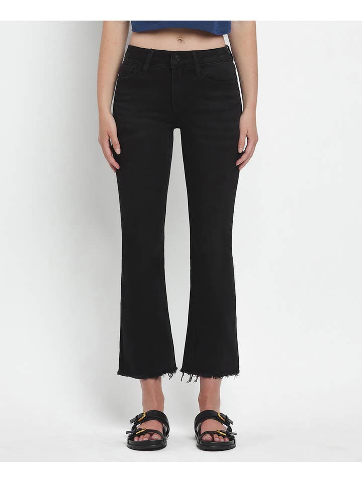 GRANDIOSITÀ JEANS CROP FLARE A VITA MEDIA CON ORLO INVECCHIATO E ORLO GREZZO LV1145 in vendita all'ingrosso su Faire