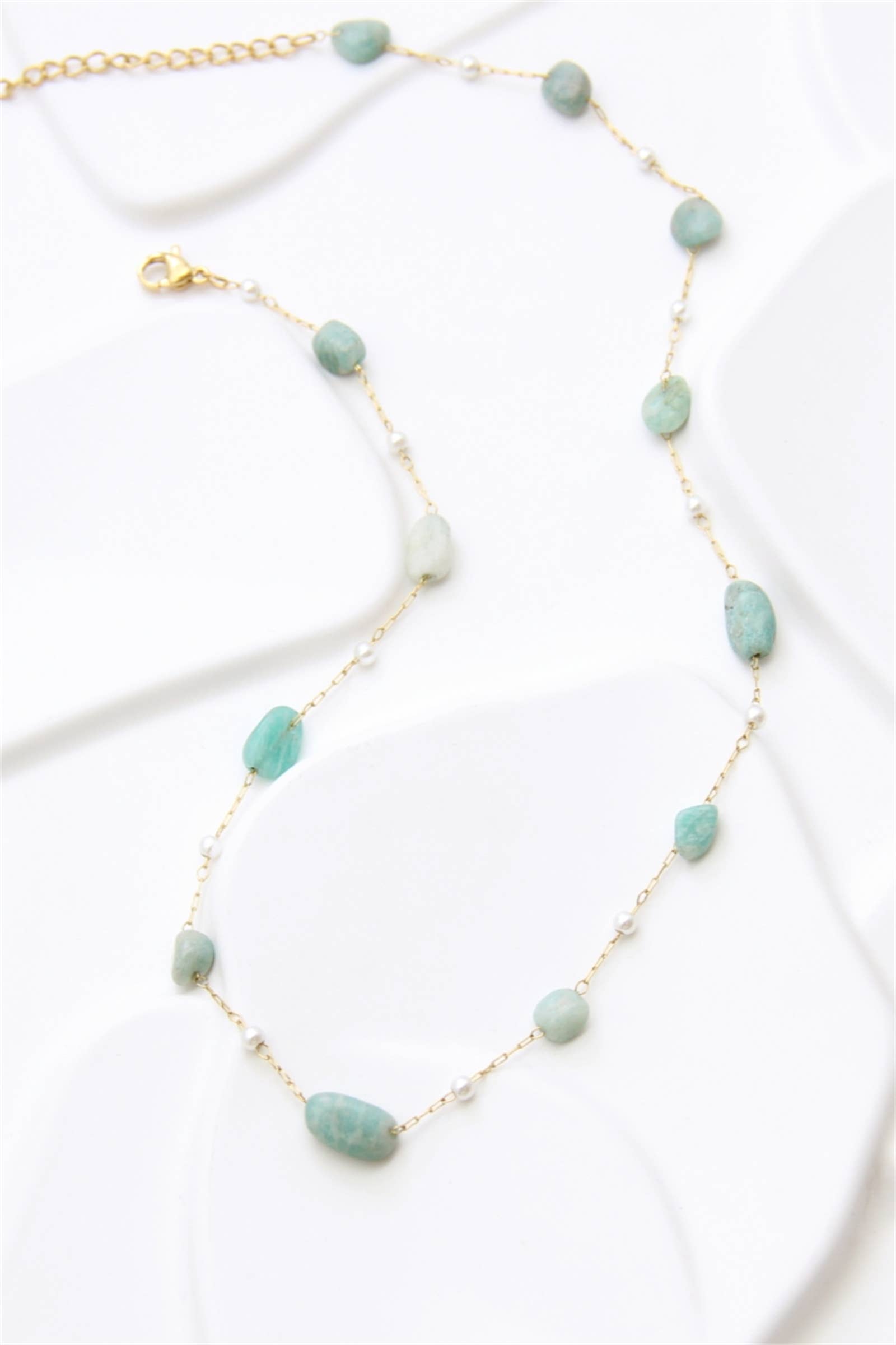 gold Stainless steel necklace adorned with natural stones and pe for wholesale on Faire0