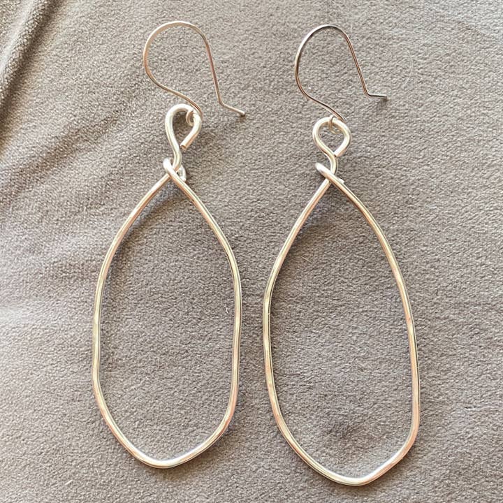 Silver Oval Hammered Hoop Earrings Organic for wholesale by Marble Designs Jewelry