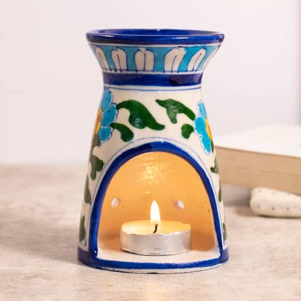 Quemaaceites decorativo de cerámica azul con diseño floral para venta al por mayor de Mytri Designs