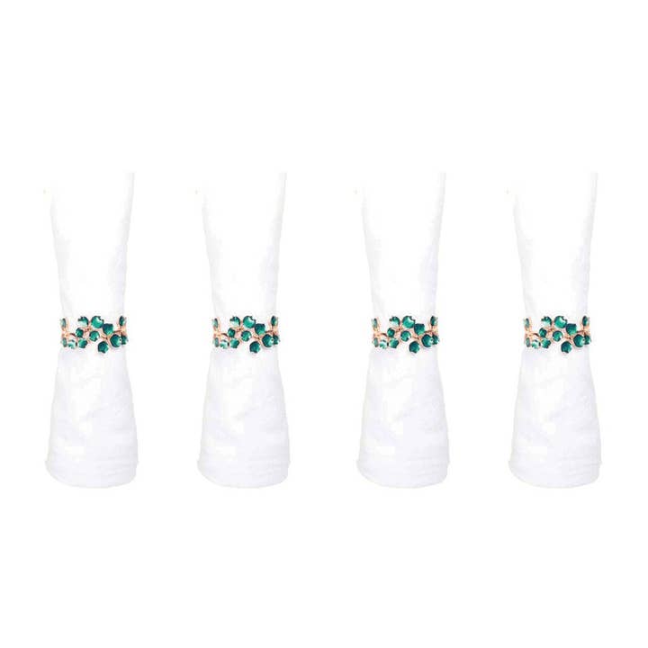 Set of 4 gold napkin rings with green diamonds for wholesale by AULICA