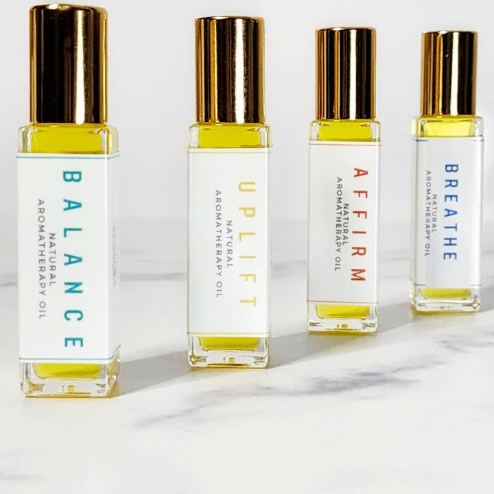 Oli per aromaterapia roll-on per la vendita all'ingrosso da parte di Uzuri Botanicals