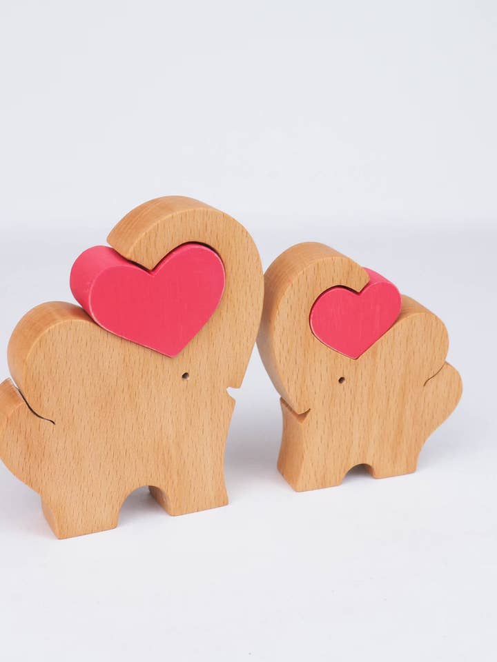 Wooden elephant figurines with love heart timeless keepsake for wholesale by Wood Metamorphosis
