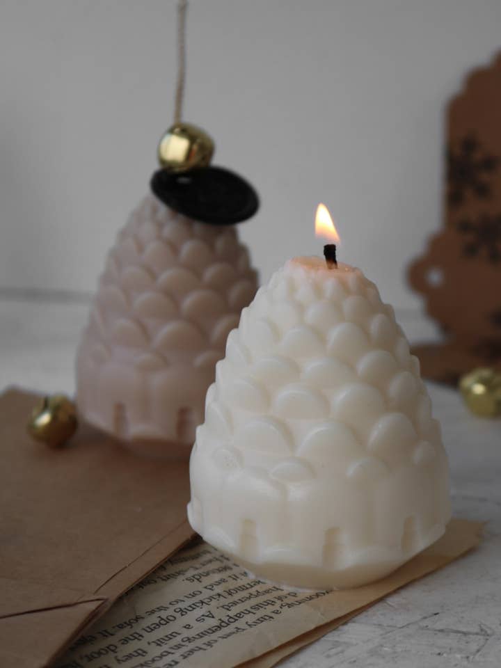 Pine cone candle for wholesale by Mae Fleur