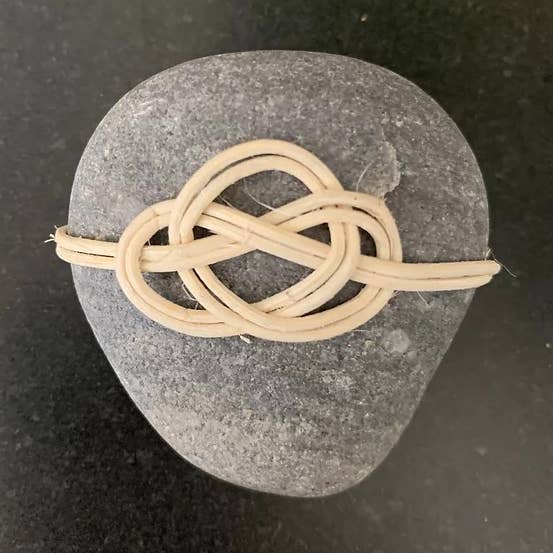 Love Knot Wrapped Rock for wholesale by Betsy Bauer Studio