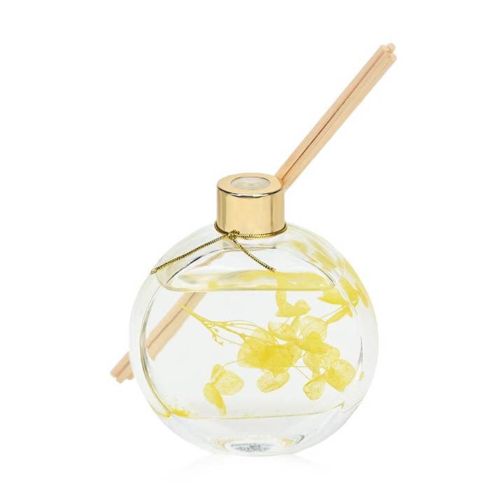 Duftdiffuser med pinde 60 ml med gule blomster fra SoapTales for engroshandel hos IngrossoBeauty by INCI Srl