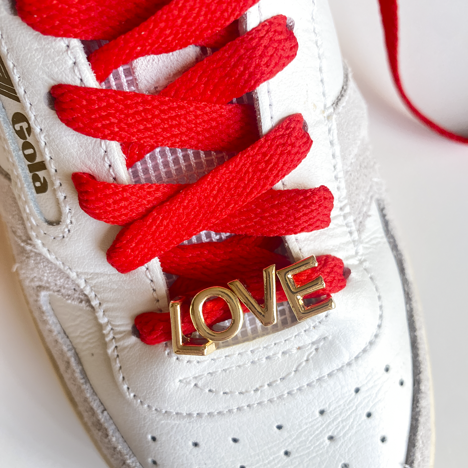 Leo & Lee Studio - Wholesale Shoelaces - Unisex - Love Sneaker Charm Sets - Gold LOVE with Red & White Laces6