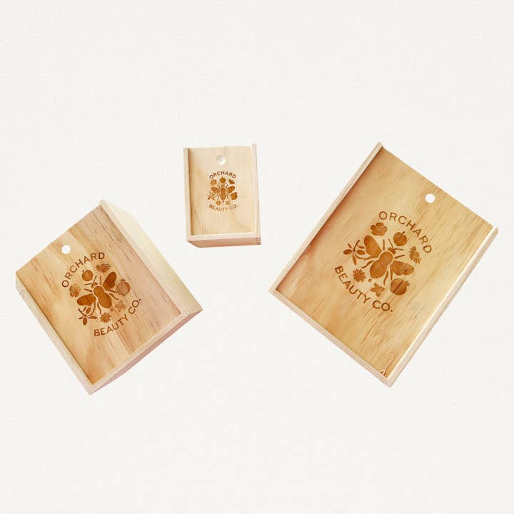 Orchard Beauty Co. Branded Wooden Slide Boxes for wholesale by Orchard Beauty Co.