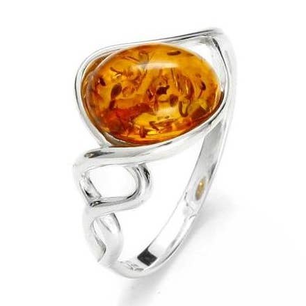 Natural oval Baltic cognac amber ring, sterling silver for wholesale by OPALOOK France