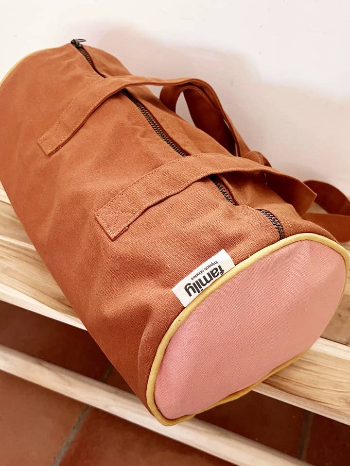 Pink/chocolate mini bolster for children for wholesale by Family Impact Stories