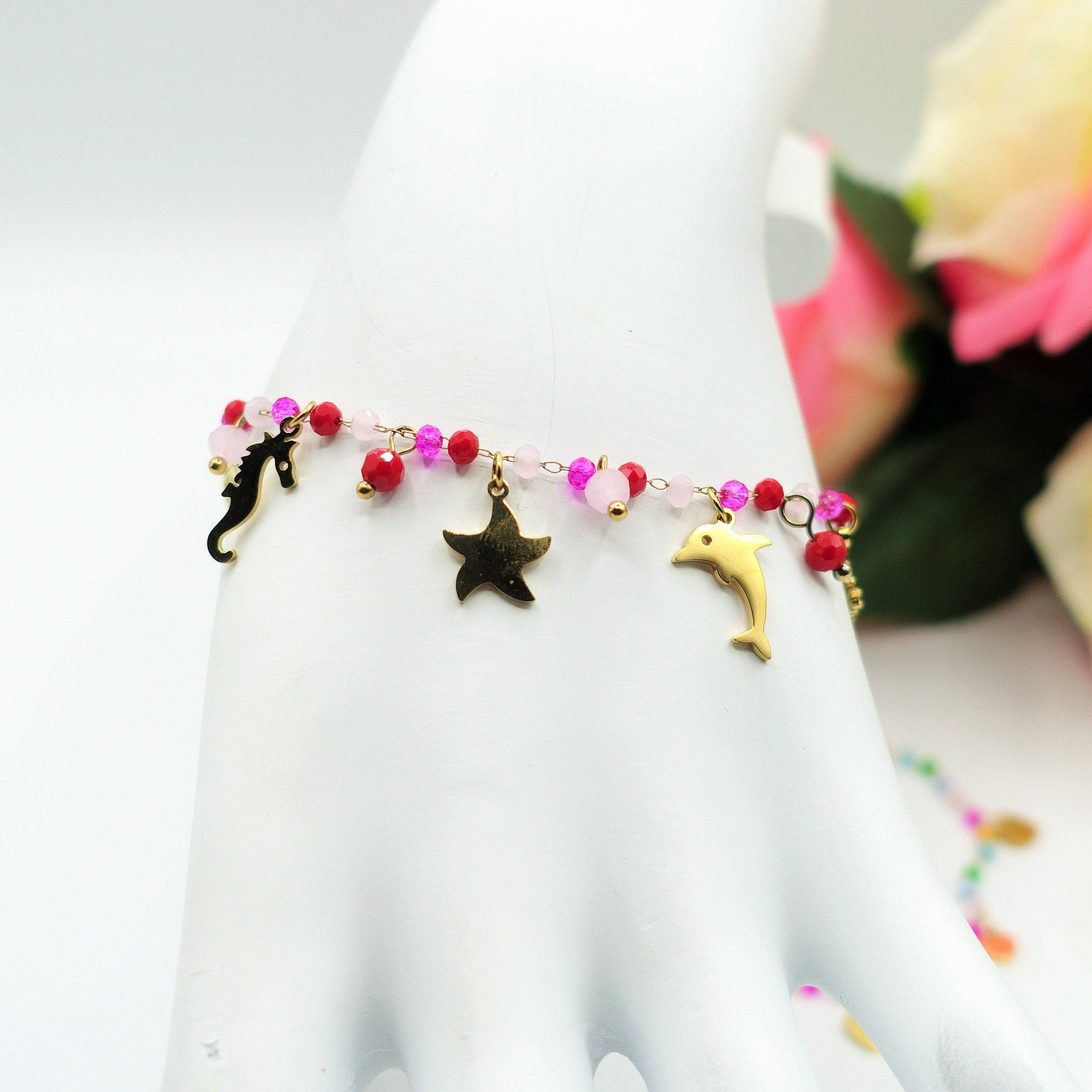 FUXIA MILOS~ ARMBAND I ROSTFRITT STÅL med pärlor och berlocker för wholesale på Faire0