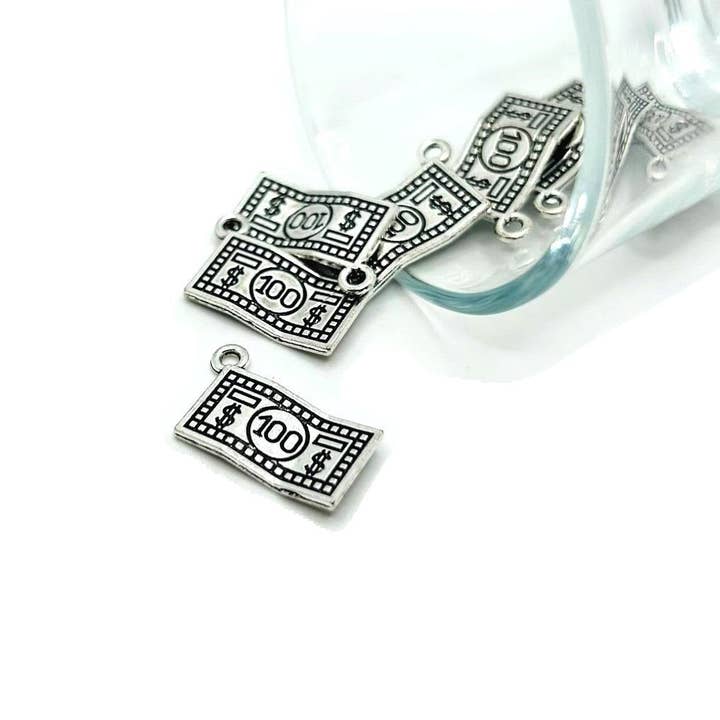 Silver Dollar Bill Money Charm, 21x13mm for wholesale by Guerrilla Charm