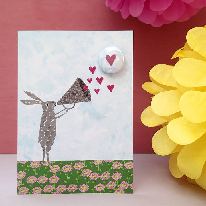 Heart Megaphone Rabbit - Greeting card with badge for wholesale by The Black Rabbit