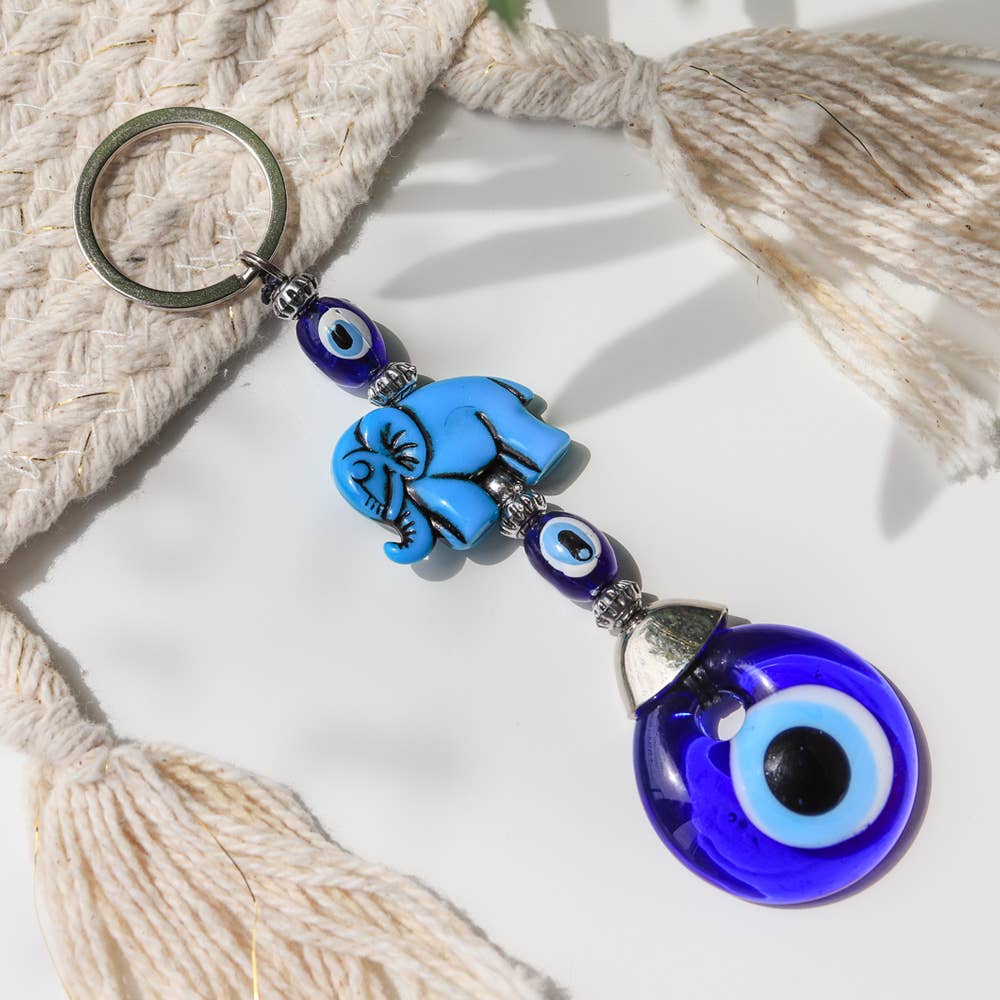 Natures Artifacts Inc – Großhandel Schlüsselanhänger – Unisex – Handgefertigter Keramik-Schlüsselanhänger mit Elefant und bösem Blick