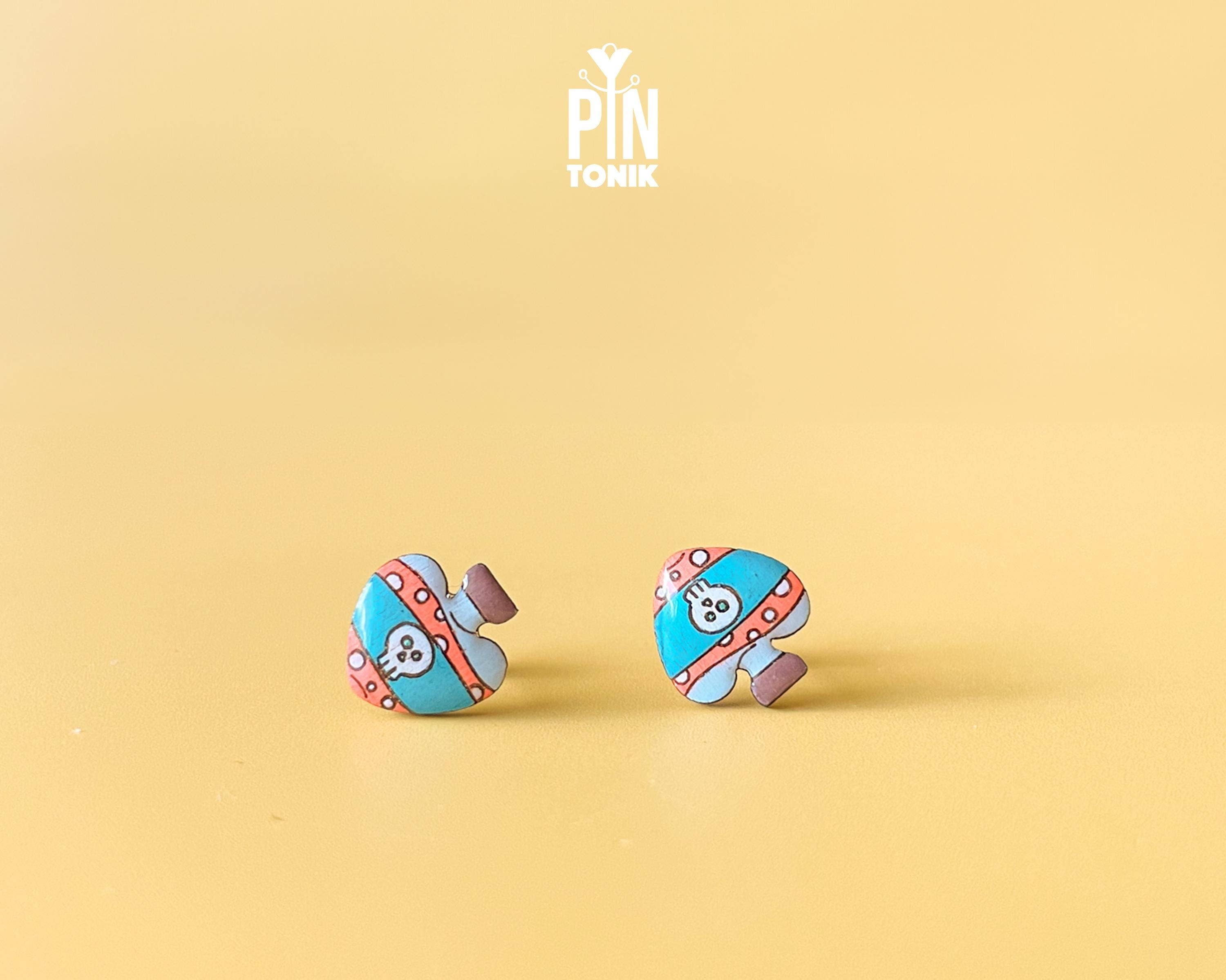 PinTonik – Engroshandel Ørestikkere – Giftige kranie ørestikker - Halloween kostumesmykker0