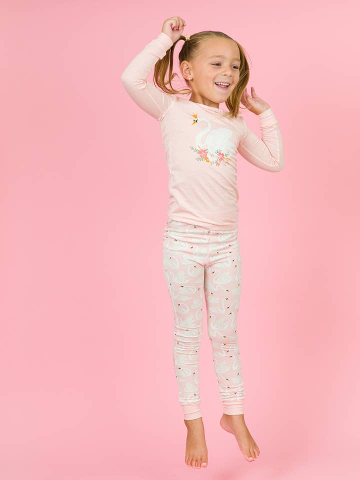 Pink Toddler Girls Swan Lake Dream Bamboo Viscose Ruffle Long Sleeve Pajama Set
for wholesale on Faire
